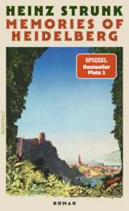 Buchcover „Memories of Heidelberg" von Heinz Strunk, Roman, Rowohlt. Eine nostalgische Illustration: Blick durch grünes Blattwerk auf das Heidelberger Schloss und die Altstadt. Roter Aufkleber „SPIEGEL Bestseller Platz 1".